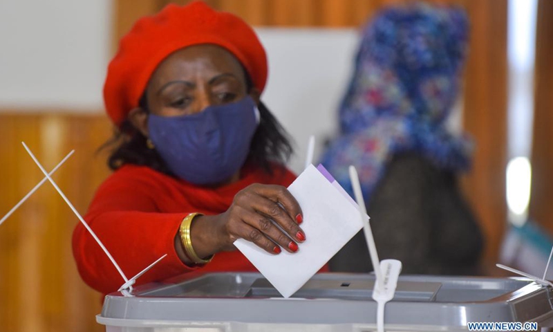 A voter casts her ballot at a polling station in Addis Ababa, Ethiopia, on June 21, 2021. Voters went to the polls in Ethiopia on Monday for the twice delayed sixth general elections. Millions of Ethiopians are voting their representatives, both for the House of Peoples' Representatives (HoPR) - the lower house of the Ethiopian parliament, as well as for the regional state councils as more than 9,000 candidates run at the federal and regional levels.(Photo: Xinhua)