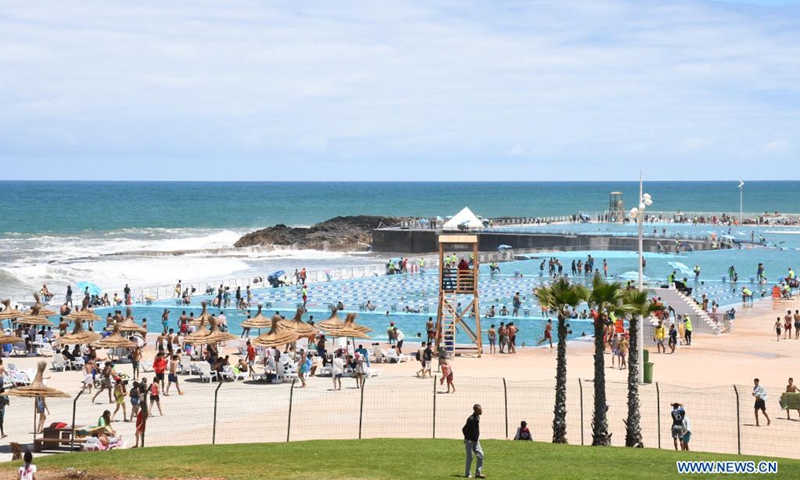 People enjoy summer time at the municipal swimming pool in Rabat, Morocco, on June 22, 2021. The municipal swimming pool of Rabat reopened recently.(Photo: Xinhua)