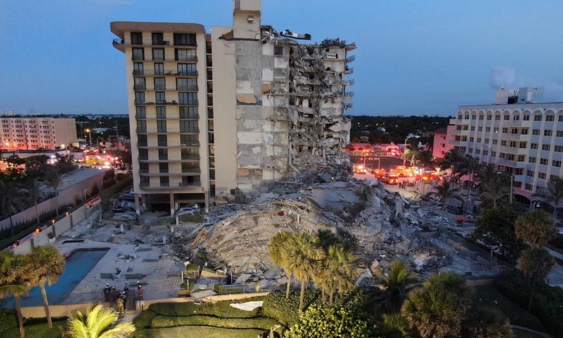 Photo released by the Miami-Dade Fire Rescue shows first responders rescuing survivors from a partially collapsed residential building in Miami-Dade County, Florida, the United States, on June 24, 2021.(Photo: Xinhua)