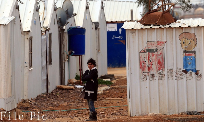 The photo taken on Dec. 8, 2018 shows a Syrian refugee child inside the Azraq refugee camp in the city of Al Azraq, northeast of Jordan.(Photo: Xinhua)