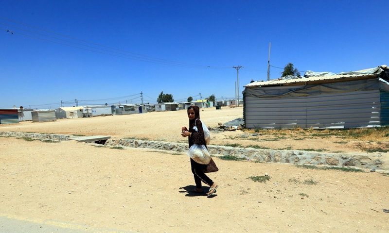 A Syrian refugee girl is seen at the Zaatari refugee camp, Jordan, on June 17, 2021.(Photo: Xinhua)