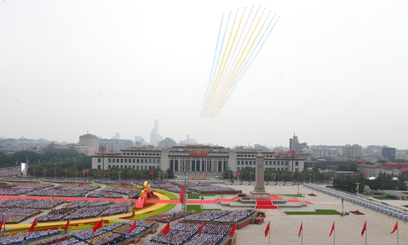 Military aircraft fly over Tian'anmen Square in echelon ahead of a grand gathering celebrating the Communist Party of China (CPC) centenary in Beijing, capital of China, July 1, 2021.(Photo: Xinhua)