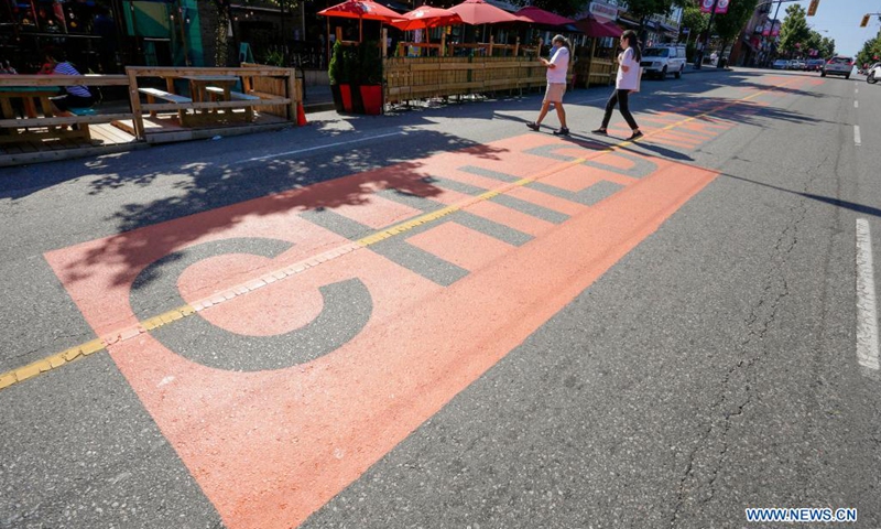 An Every Child Matters street mural is seen on Commercial Drive in Vancouver, British Columbia, Canada, on July 3, 2021. The street mural was painted to honor victims and survivors of former indigenous residential schools.(Photo: Xinhua)