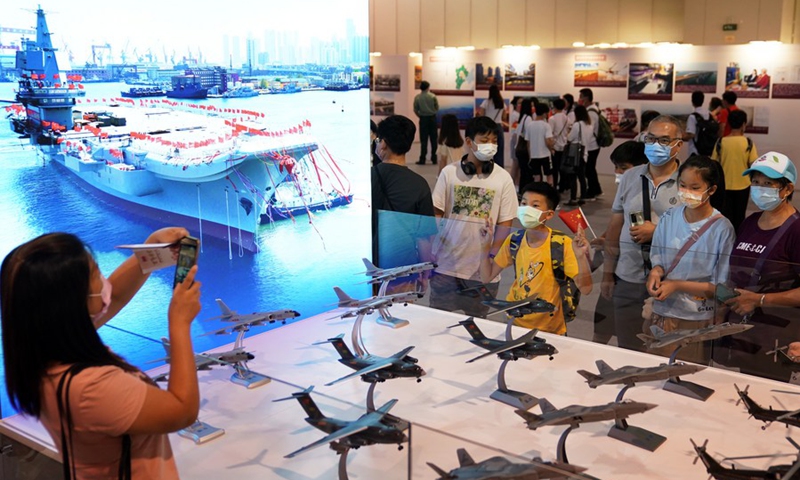 Hong Kong residents visit the exhibition on the history and achievements of the Communist Party of China (CPC) in Hong Kong, south China, July 3, 2021. (Photo: Xinhua)