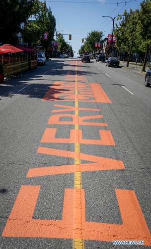 An Every Child Matters street mural is seen on Commercial Drive in Vancouver, British Columbia, Canada, on July 3, 2021. The street mural was painted to honor victims and survivors of former indigenous residential schools.(Photo: Xinhua)
