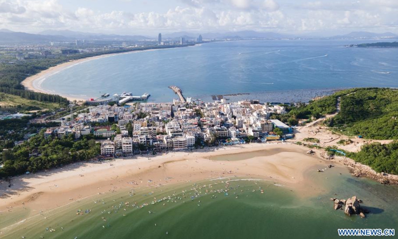 Aerial view of Tenghai fishing village is seen in Sanya, south China's Hainan Province, July 9, 2021. Located in Haitang bay of Sanya, Tenghai fishing village has attracted lots of tourists by developing tourism, surfing and homestay industries since 2018. Photo:Xinhua