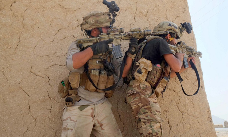 Afghan security force members take part in a fight against Taliban militants in Panjwai district of Kandahar province, southern Afghanistan, July 5, 2021.(Photo: Xinhua)