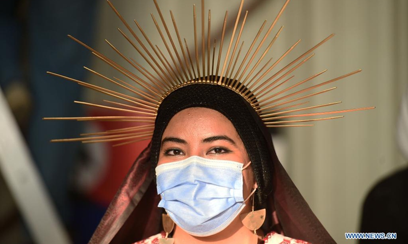 A woman takes part in an art event in Ahmadi Governorate, Kuwait, on July 10, 2021. Artists, activists and entrepreneurs in Kuwait held an art event on Saturday to raise money for and express solidarity with the Palestinian people.  (Photo: Xinhua)