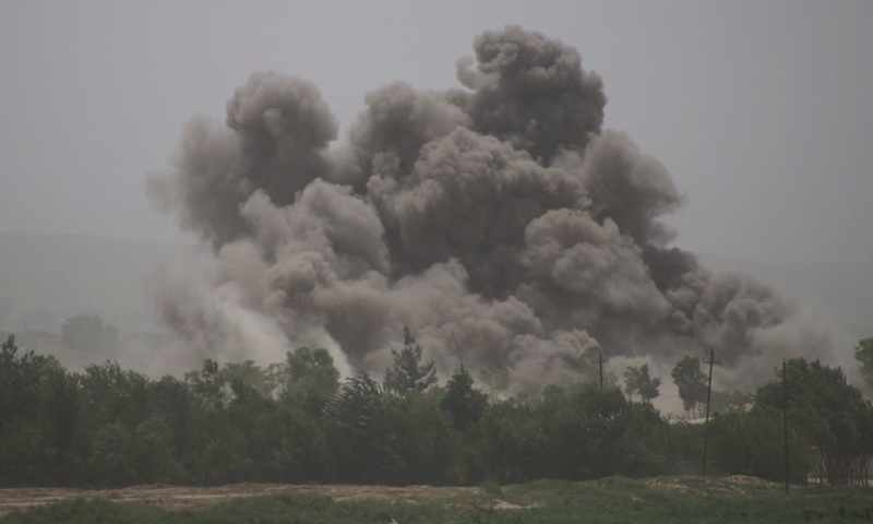 Photo taken on July 9, 2021 shows smoke rising from Taliban positions after an airstrike by Afghan Air Force on outskirts of Shiberghan city, capital of Jawzjan province, Afghanistan.(Photo: Xinhua)