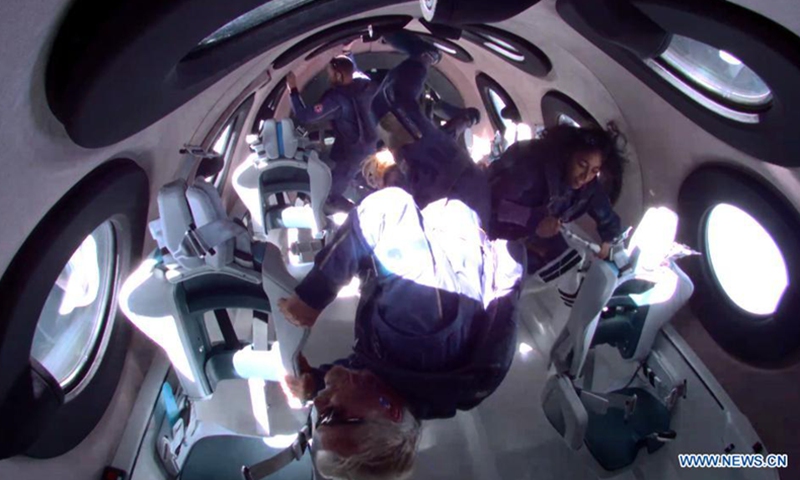 Photo released by Virgin Galactic on July 11, 2021 shows Unity 22 crew at zero gravity. Space tourism company Virgin Galactic completed its first fully crewed test flight of its spacecraft on Sunday, making a giant leap toward commercial suborbital spaceflight. The mission, dubbed Unity 22, was the company's fourth crewed spaceflight, and the 22nd flight test for the company's spacecraft VSS Unity. (Photo: Xinhua)