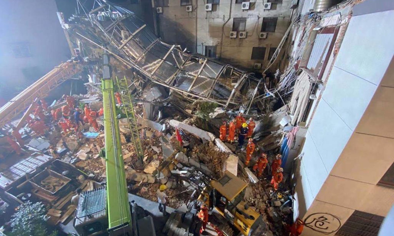 Rescuers work at the site of a collapsed building in Suzhou, east China's Jiangsu Province, July 12, 2021. One person died, and another 10 people are missing after a building collapsed Monday in east China's Jiangsu Province, local authorities said. The incident happened at around 3:33 p.m. Monday at a hotel in Wujiang District in the city of Suzhou, the district government said. (Photo: Xinhua)