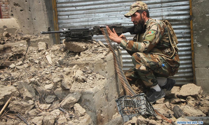 A member of Afghan security force takes part in a military operation against Taliban militants in Alishing district of Laghman province, eastern Afghanistan, on July 12, 2021. Taliban militants have been intensifying activities to capture more districts, as the U.S. troops are completing the pull-out from Afghanistan. In the meantime, Afghan security forces have been conducting counter-offensives to foil the militant group's efforts.(Photo: Xinhua)