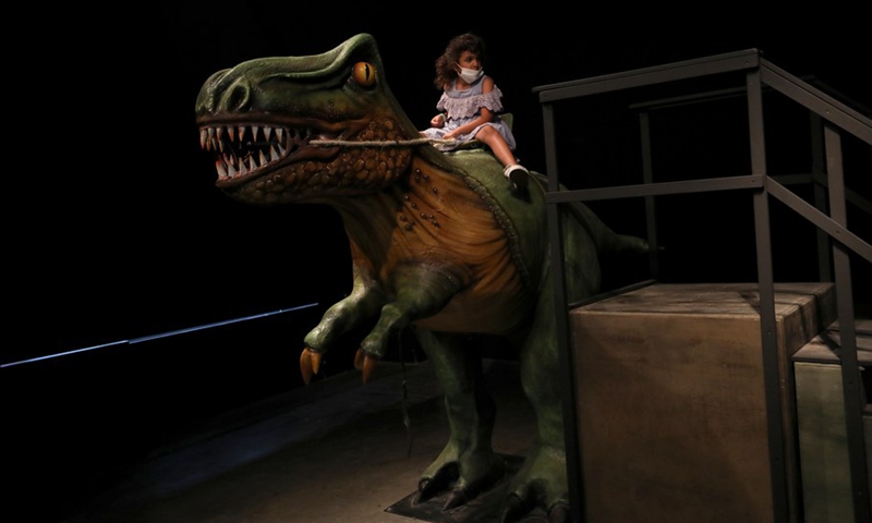 A girl visits an exhibition of dinosaurs at Madatech, Israel National Museum of Science, Technology and Space, in the northern Israeli city of Haifa, July 13, 2021.(Photo: Xinhua)