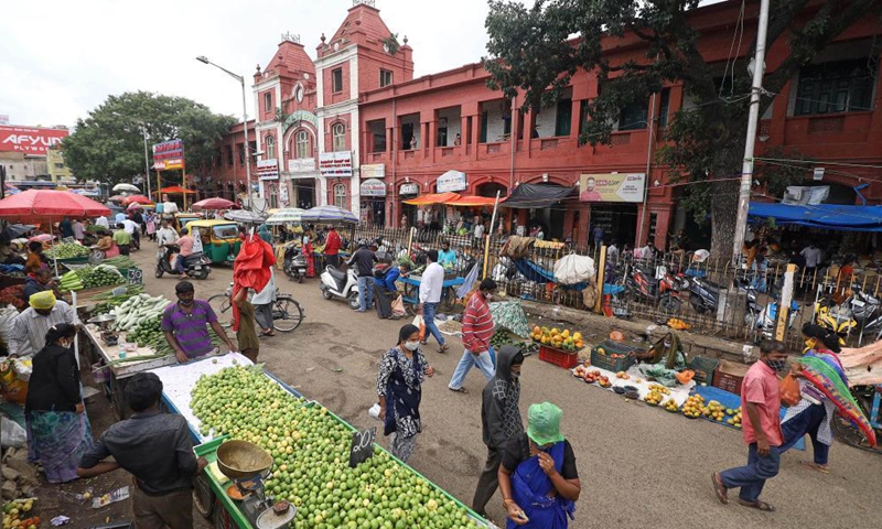 Vendors resume business as the COVID-19 restrictions ease at one of the oldest market in Bangalore, India, July 16, 2021.Photo:Xinhua