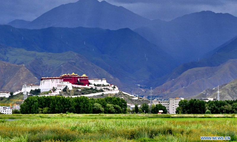 the potala palace is seen near the lhalu wetland national nature