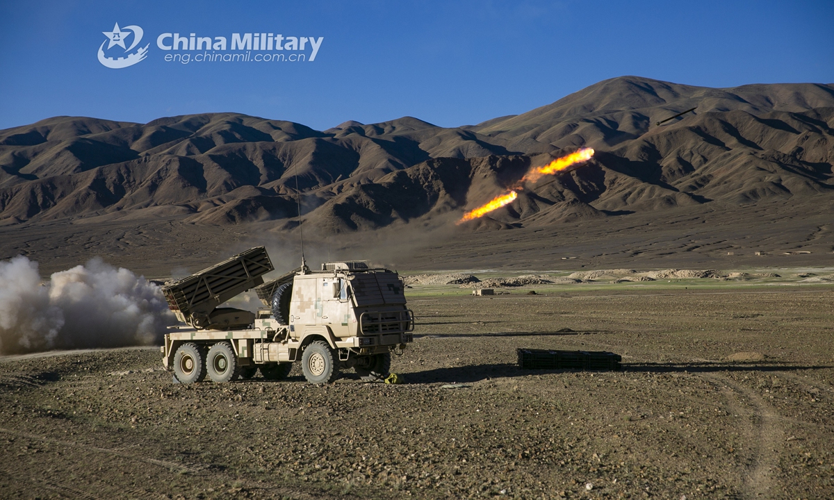Long-range multiple launch rocket systems (LRMLRS) attached to an artillery detachment with a regiment under the PLA Army fire rockets during a live-fire training exercise in early July, 2021.Photo:China Military