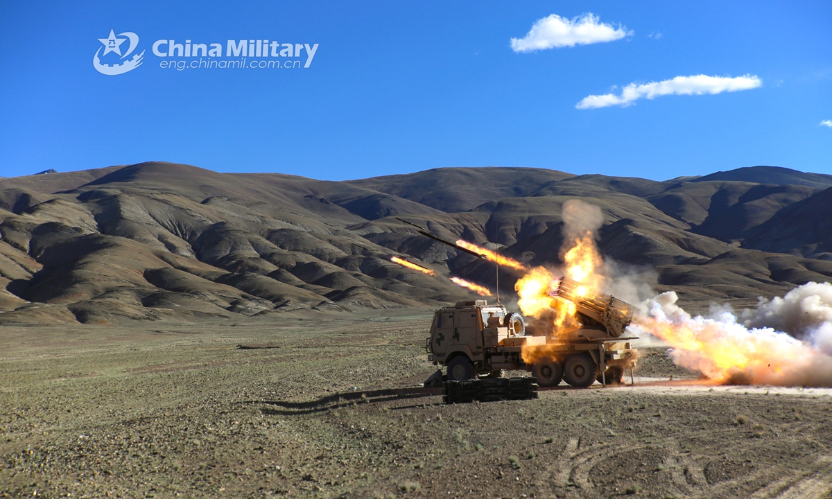 Long-range multiple launch rocket systems (LRMLRS) attached to an artillery detachment with a regiment under the PLA Army fire rockets during a live-fire training exercise in early July, 2021.Photo:China Military