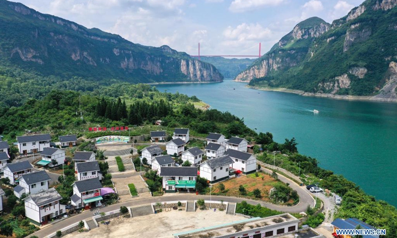 Aerial photo taken on July 24, 2021 shows a view of a relocation site for poverty alleviation at Huawu Village in Xinren Miao Township, Qianxi City, southwest China's Guizhou Province. Huawu Village, although boasting unique ethnic Miao culture and splendid mountain views with vast water bodies, once had a poverty headcount ratio as high as 63.6 percent.(Photo: Xinhua)