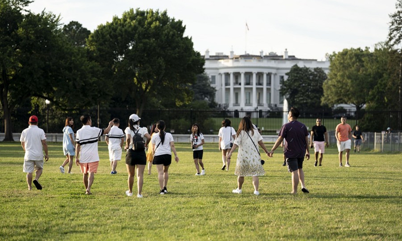 People wander near the White House in Washington, D.C., the United States, June 22, 2021.(Photo: Xinhua)