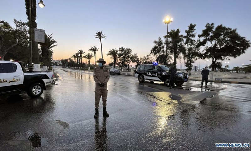 Soldiers stand guard during curfew hours in Tripoli, capital city of Libya, on July 28, 2021. The Libyan Government on Monday imposed a curfew due to increasing COVID-19 infections, while the nationwide vaccination continues. The curfew will last for two weeks from 6 p.m. to 6 a.m.(Photo: Xinhua)
