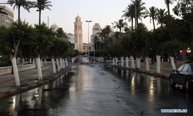 Photo taken on July 28, 2021 shows an empty street during curfew hours in Tripoli, Libya. The Libyan Government on Monday imposed a curfew due to increasing COVID-19 infections, while the nationwide vaccination continues. The curfew will last for two weeks from 6 p.m. to 6 a.m.(Photo: Xinhua)