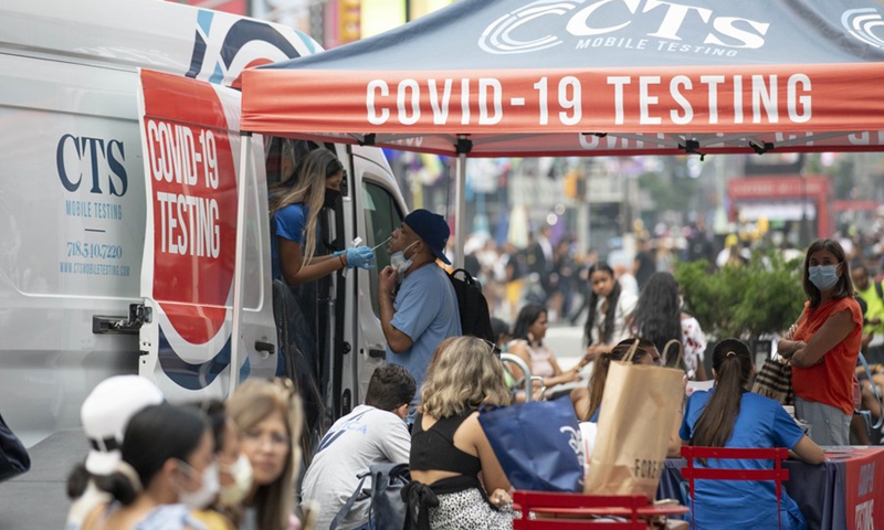 A man receives COVID-19 test at a mobile testing site in Times Square, New York, the United States, July 20, 2021. (Photo: Xinhua)