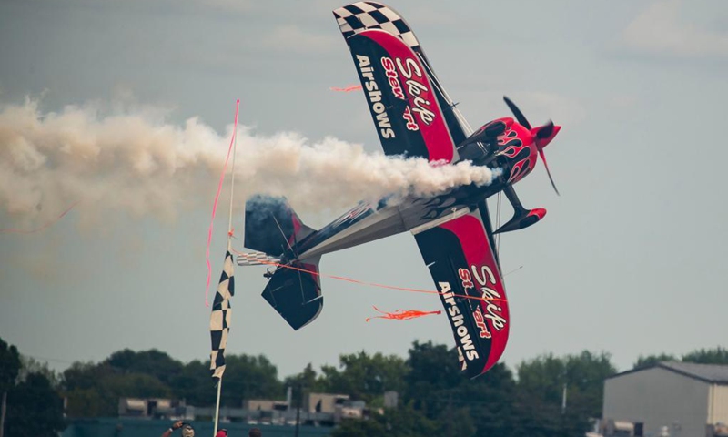 An aircraft performs at the Experimental Aircraft Association (EAA) AirVenture 2021 in Oshkosh, Wisconsin, the United States, July 30, 2021. The EAA AirVenture, an annual air show that gathers aviation enthusiasts, is ongoing from July 26 to Aug. 1, 2021.Photo:Xinhua
