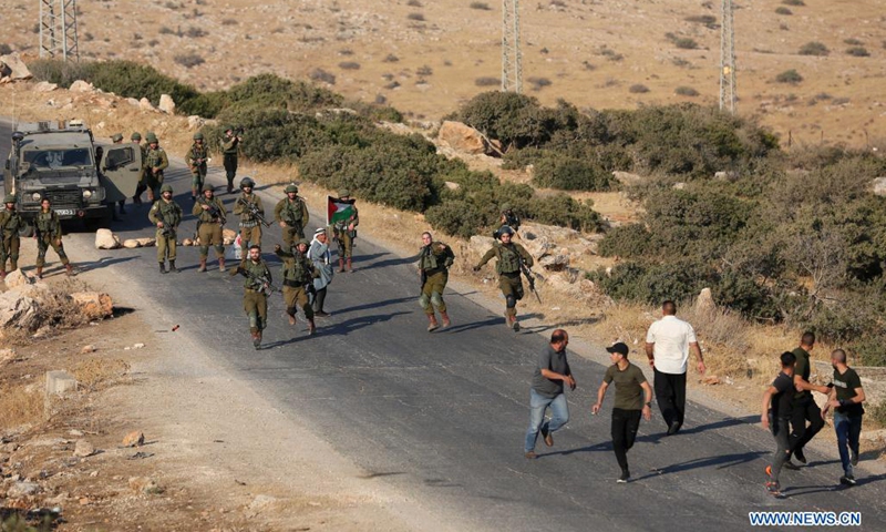 Palestinian protesters clash with Israeli soldiers following a protest against the expanding of Jewish settlements at Tayasir checkpoint, east of the West Bank city of Tubas, July 31, 2021.(Photo: Xinhua)