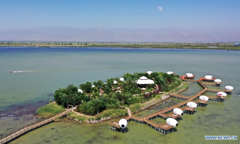 Aerial photo taken on July 31, 2021 shows the scenery of the Shahu Lake scenic area in Pingluo County, Shizuishan, northwest China's Ningxia Hui Autonomous Region.(Photo: Xinhua)
