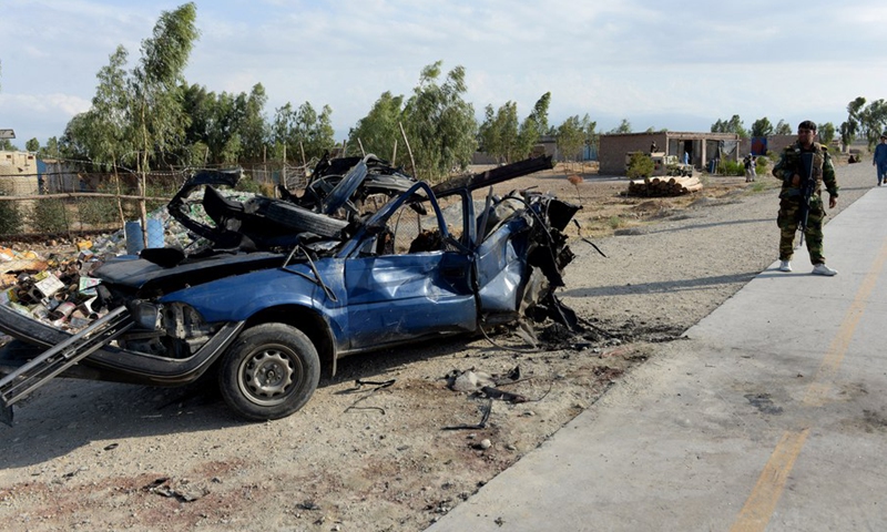 Photo taken on July 21, 2021 shows a damaged vehicle at the site of a bomb explosion in Khogiani district of Nangarhar province, Afghanistan.(Photo: Xinhua)