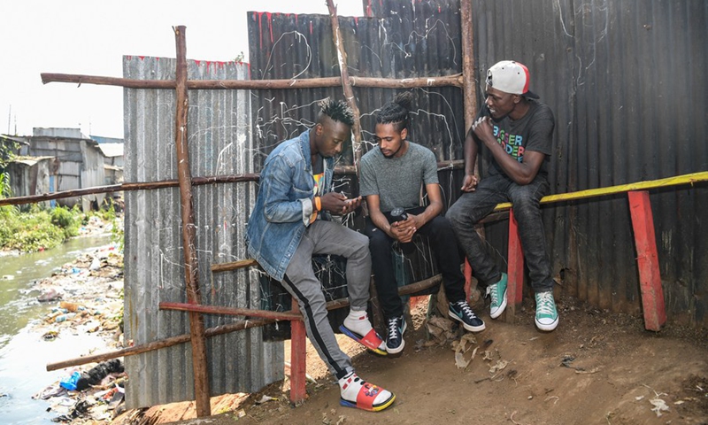 The members of Cyplez music band practise one of their songs in Mathare slums, Nairobi, Kenya, on July, 27, 2021.(Photo: Xinhua)