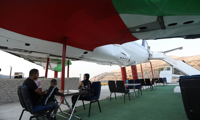 Palestinians visit the Boeing 707 plane transformed into a restaurant in the West Bank city of Nablus on July 25, 2021 (Photo: Xinhua)
