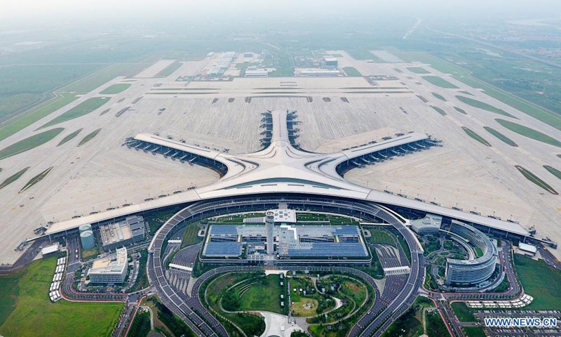 Aerial photo shows the Qingdao Jiaodong International Airport in Qingdao, east China's Shandong Province, Aug. 11, 2021. The new Qingdao Jiaodong International Airport will be put into operation on Aug. 12, while the old Qingdao Liuting International Airport will be closed. Positioned as an international hub airport in Northeast Asia, the new airport is planned to meet 35 million annual passenger throughput by 2025.(Photo: Xinhua)
