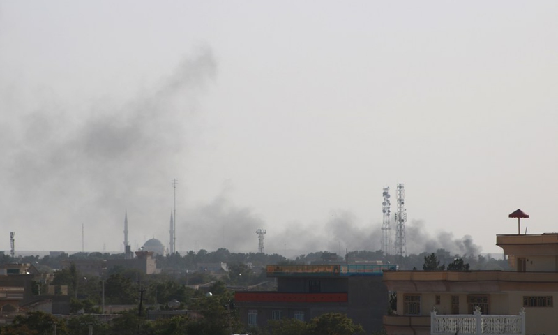 Photo taken on Aug. 6, 2021 shows smoke rising during gun fights in Shiberghan, capital of Jawzjan Province, Afghanistan. (Photo: Xinhua)