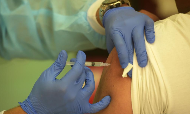 A medical worker administers a dose of COVID-19 vaccine in Jakarta, Indonesia, Aug. 14, 2021.Photo:Xinhua