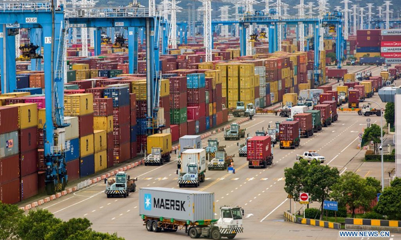 Photo taken on Aug. 15, 2021 shows a view of the Ningbo-Zhoushan Port in Ningbo, east China's Zhejiang Province. The Ningbo-Zhoushan Port saw its container throughput reach 20 million TEUs (Twenty-foot Equivalent Units) on Sunday, one month earlier than last year.(Photo: Xinhua)