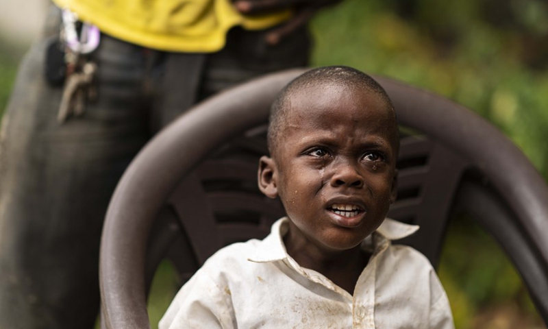 A child reacts while receiving medical treatment after an earthquake, in Les Cayes, Haiti, on Aug. 16, 2021.(Photo: Xinhua)