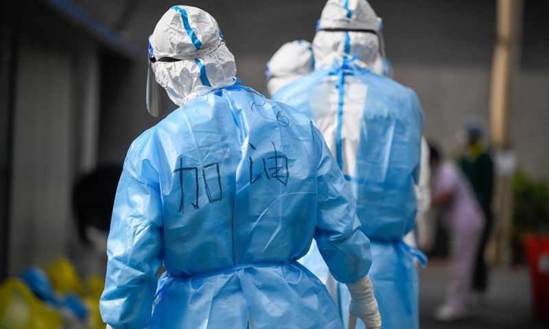 Medical workers wait to submit COVID-19 samples for nucleic acid test at the center for disease control and prevention in Fengman District of Jilin City, northeast China's Jilin Province, May 17, 2020.Photo:Xinhua