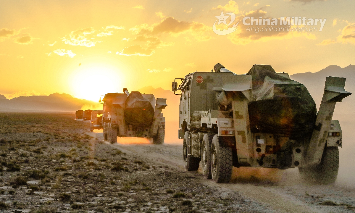 A convoy of truck-mounted artillery attached to a regiment under the PLA Xinjiang Military Command maneuver in speed en route to an assembly area for a round-the-clock field live-ammunition firing training in mid August, 2021.Photo:China Military