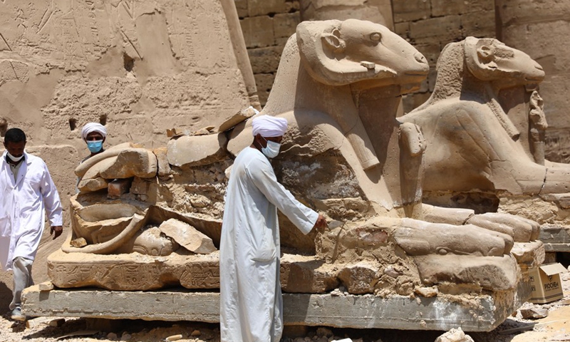 Restorers renovate a statue of Sphinx in Luxor, Egypt, on Aug. 25, 2021.(Photo: Xinhua)