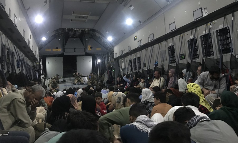 People take a military aircraft of Germany to leave Kabul, Afghanistan, Aug. 24, 2021.(Photo: Xinhua)
