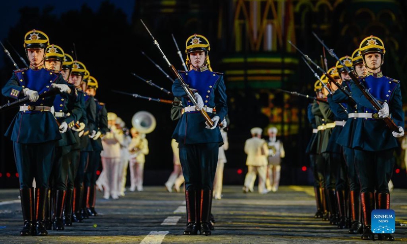 Servicemen of the Honor Guard of the Presidential Regiment perform during the opening of the Spasskaya Tower International Military Music Festival in Moscow, Russia, on Aug. 27, 2021. The annual military music festival opened on Friday on the Red Square in Moscow, and will run until September 5.Photo:Xinhua