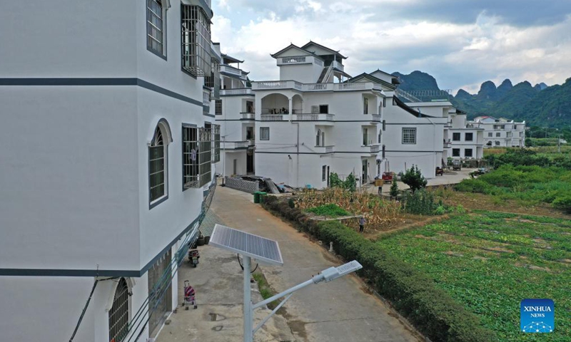 Aerial photo taken on July 14, 2021 shows solar powered street lamps in Laoya Village of Guilin City, south China's Guangxi Zhuang Autonomous Region. More and more solar powered street lamps have been erected in areas tucked away in the mountains in Guangxi, illuminating the night sky for people living there. Photo:Xinhua
