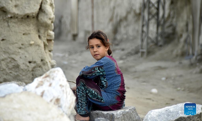 An Afghan refugee girl is seen at a refugee camp in northwest Pakistan's Peshawar on Aug. 28, 2021. Pakistan currently hosts more than 1.4 million registered Afghan refugees who have been forced to flee their homes, according to the United Nations High Commissioner for Refugees (UNHCR).(Photo: Xinhua)