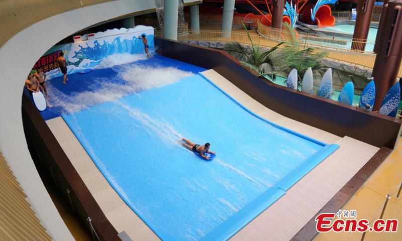 People experience the Water World Ocean Park project in Hong Kong, Sept.2, 2021. Seven major facilities of Hong Kong's Water World Ocean Park were unveiled for the first time on Thursday. The park, which cost about HK $4 billion( about $514 million) and took more than five years to construct, will officially open to the public on September 21. It is the only major water park in Hong Kong, featuring 27 indoor and outdoor attractions in five themed areas.Photo:Xinhua