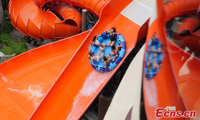 People experience the Water World Ocean Park project in Hong Kong, Sept.2, 2021. Seven major facilities of Hong Kong's Water World Ocean Park were unveiled for the first time on Thursday. The park, which cost about HK $4 billion( about $514 million) and took more than five years to construct, will officially open to the public on September 21. It is the only major water park in Hong Kong, featuring 27 indoor and outdoor attractions in five themed areas.Photo:Xinhua