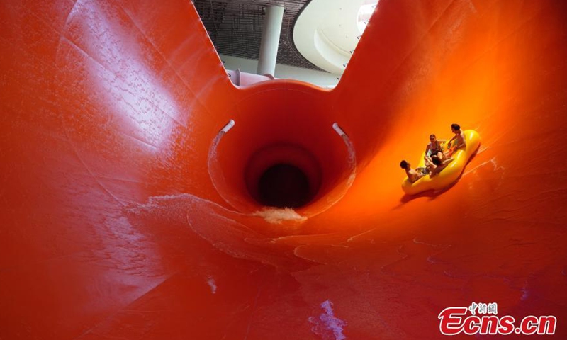 People experience the Water World Ocean Park project in Hong Kong, Sept.2, 2021. Seven major facilities of Hong Kong's Water World Ocean Park were unveiled for the first time on Thursday. The park, which cost about HK $4 billion( about $514 million) and took more than five years to construct, will officially open to the public on September 21. It is the only major water park in Hong Kong, featuring 27 indoor and outdoor attractions in five themed areas.Photo:Xinhua