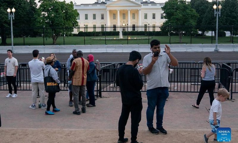 Tourists are seen near the White House in Washington, D.C., the United States, Sept. 3, 2021.Photo:Xinhua