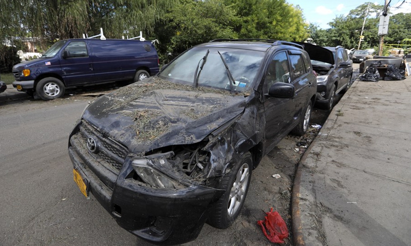 Waterlogged vehicles are seen in the Flushing neighborhood of the Queens borough of New York, the United States, Sept. 3, 2021.(Photo: Xinhua)