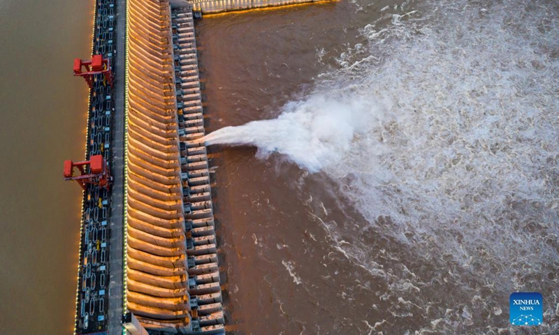 Aerial photo taken on Sept. 6, 2021 shows a view of the Three Gorges Dam in central China's Hubei Province. Chinese authorities have called for rigorous anti-flooding measures along the Yangtze River as water levels continue to rise following heavy rainfall, the Ministry of Water Resources said on Monday. The flow of water at the Three Gorges reservoir has increased rapidly, reaching 54,000 cubic meters per second as of 2 p.m. Monday.(Photo: Xinhua)